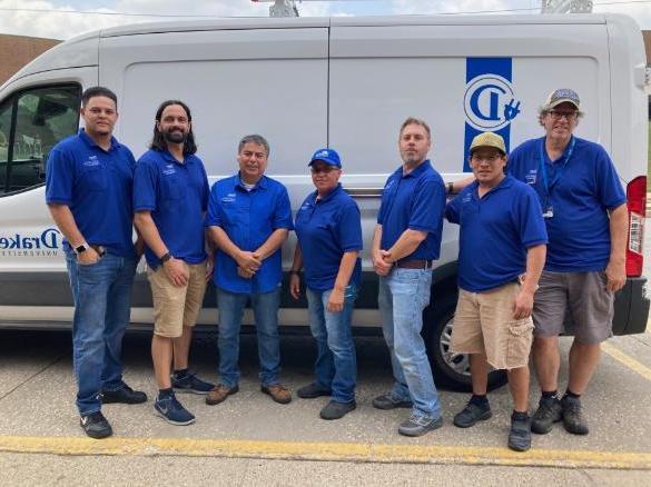 a photo of the building maintenance team